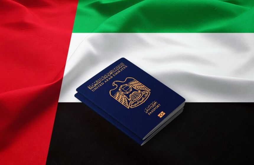 dubai uae passport on uae flag